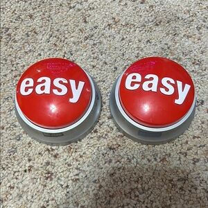 set of two easy buttons from Staples one easy for kids and one classic ￼